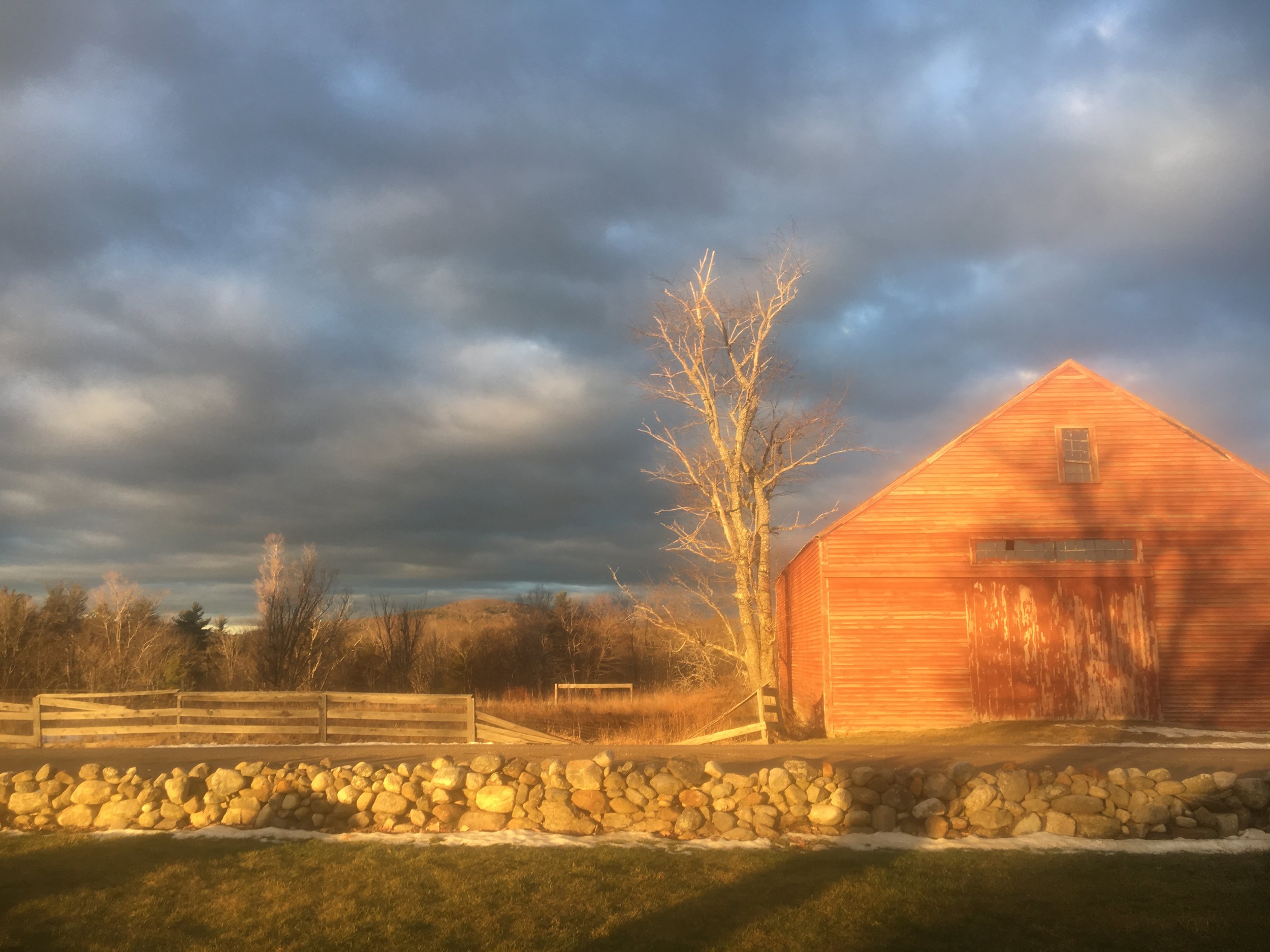Sunlight on the farm’s red barn and stone wall, from Blasty Bough’s gallery